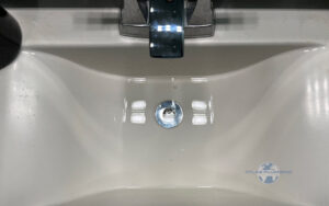 Clogged Sink Drain Buildup in Residential Plumbing Pipe